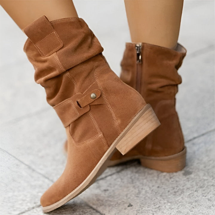 Fashionable women's ruched ankle boots with a practical side zip, offering all-day comfort.
