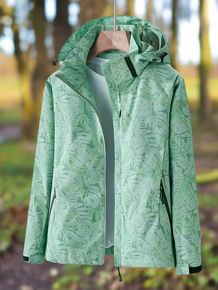 Women's stylish waterproof summer jacket in lightweight, breathable fabric, perfect for outdoor wear & rain protection.