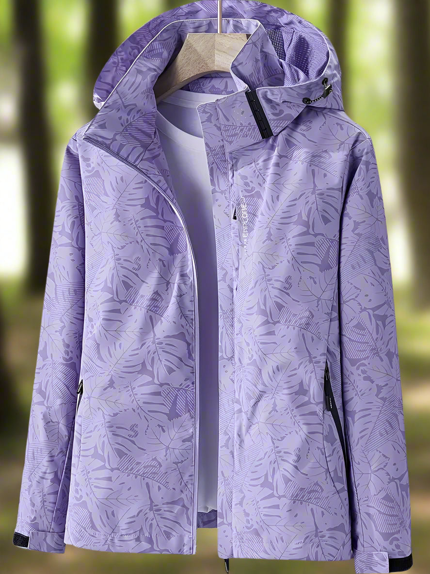 Elegant women's waterproof summer jacket, lightweight & breathable outerwear, perfect for stylish protection from rain.