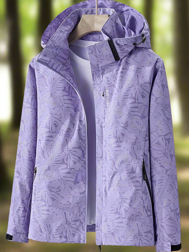Elegant women's waterproof summer jacket, lightweight & breathable outerwear, perfect for stylish protection from rain.