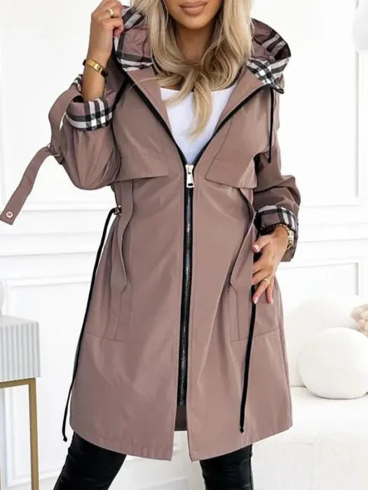 Women's stylish waterproof & windproof zip coat. Perfect all-weather outerwear for commuting and travel.