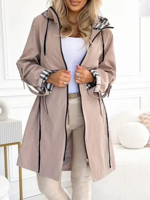 Versatile women's windproof rain jacket. Ideal lightweight fall/winter outerwear for all-weather style.