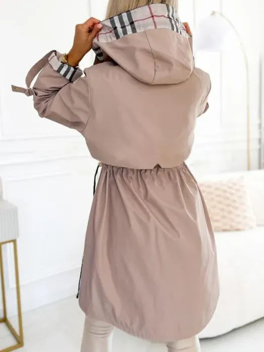 Elegant women's all-weather coat with full zip. Provides ultimate waterproof & windproof protection for any forecast.