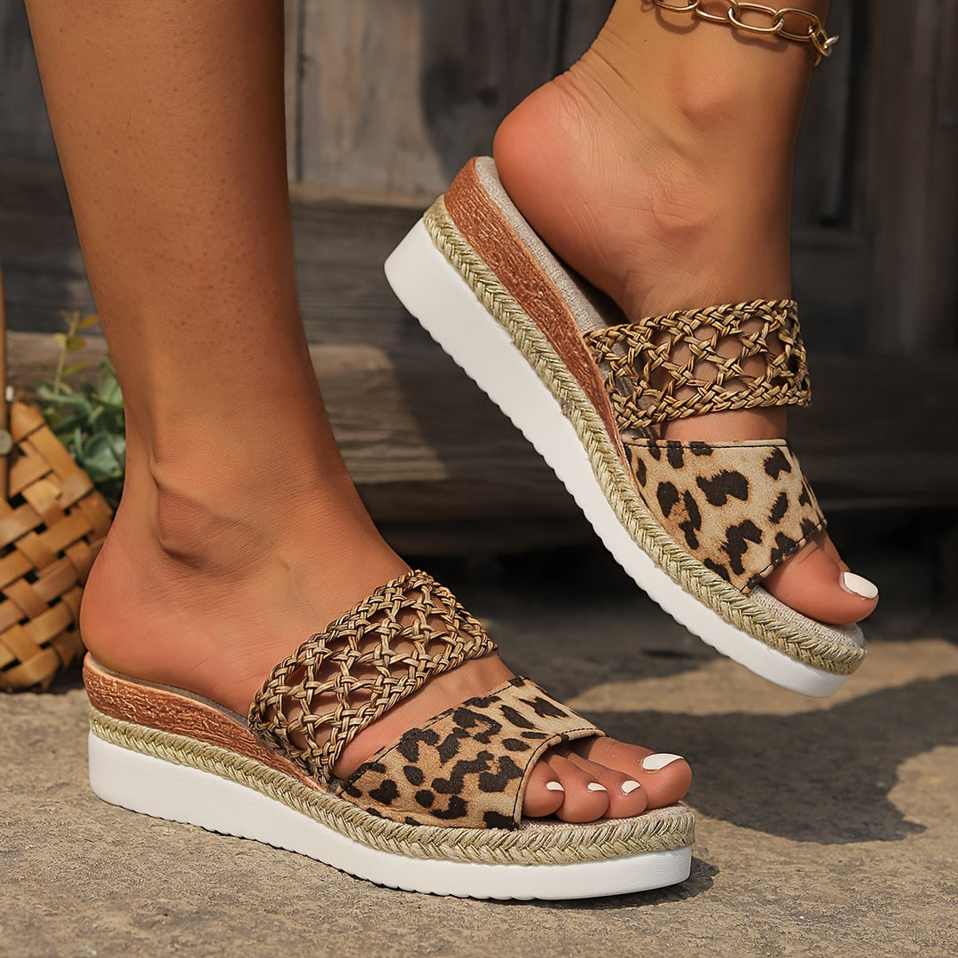 Ladies stylish woven wedge sandals, essential summer footwear offering both comfort and chic design.