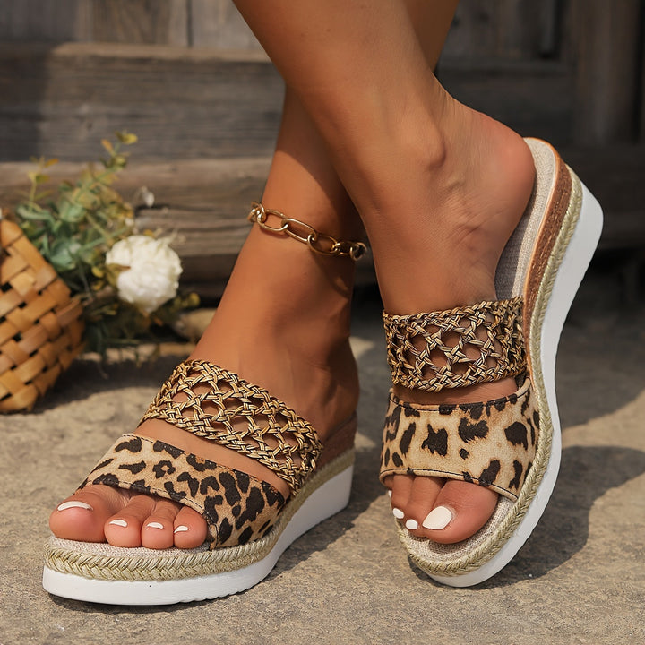 Comfortable women's wedge sandals with woven straps, perfect for summer casual wear and all-day comfort.
