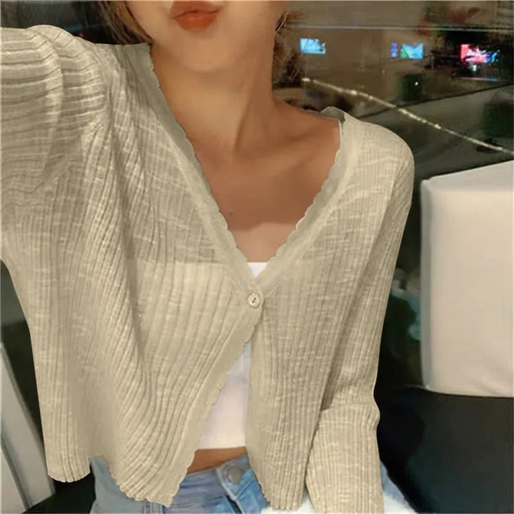 Women's summer cropped cardigan. Button-front, long-sleeve, lightweight top for easy spring and summer layering.
