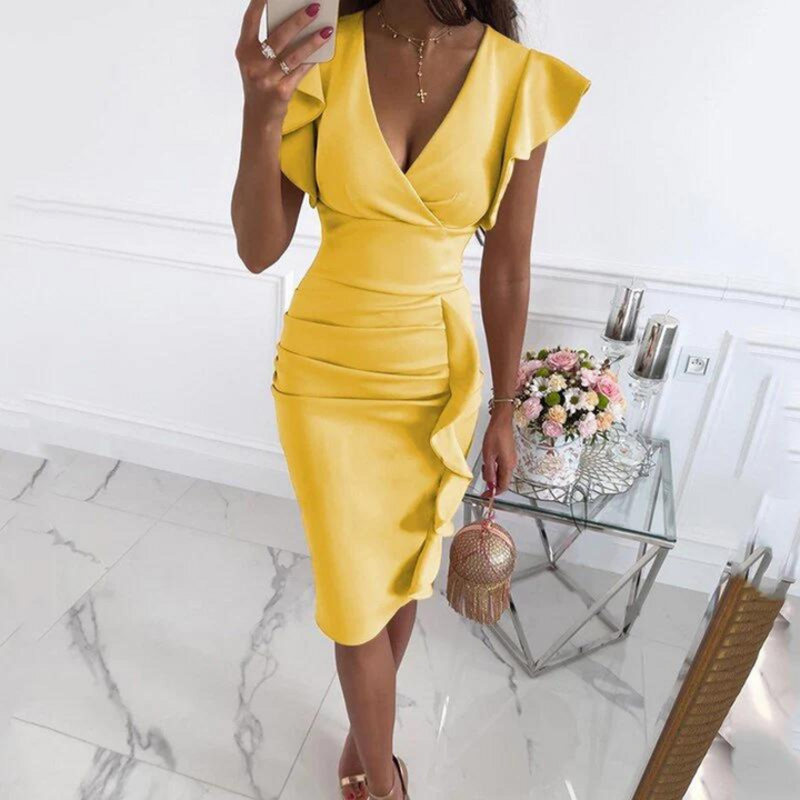 Elegant women's V-neck midi dress, perfect for casual wear, holidays, or day events. Features a flattering fit.
