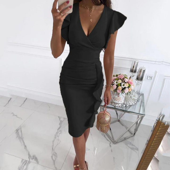Flattering fitted V-neck midi dress for women, ideal for summer. Combines casual comfort with elegant style.
