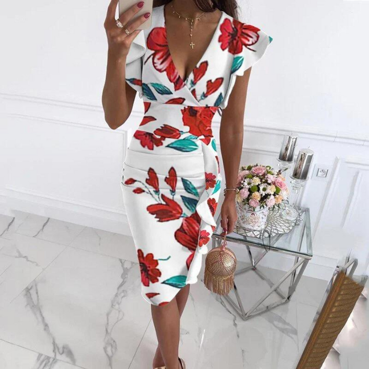 Versatile women's midi dress with V-neck and short sleeves. A perfect day dress for summer, offering comfort.