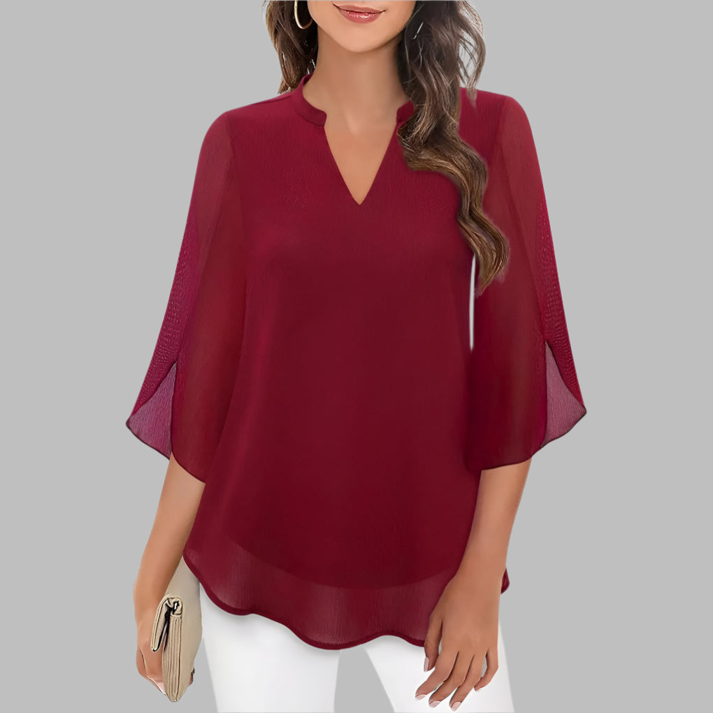 Elegant women's spring v-neck blouse with flattering petal sleeves. Versatile short sleeve top for office or casual wear.