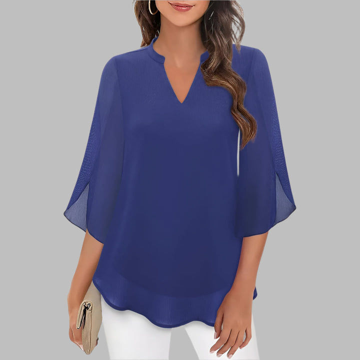 Women's casual v-neck summer top with unique petal sleeves. A stylish and versatile short sleeve blouse for everyday wear.