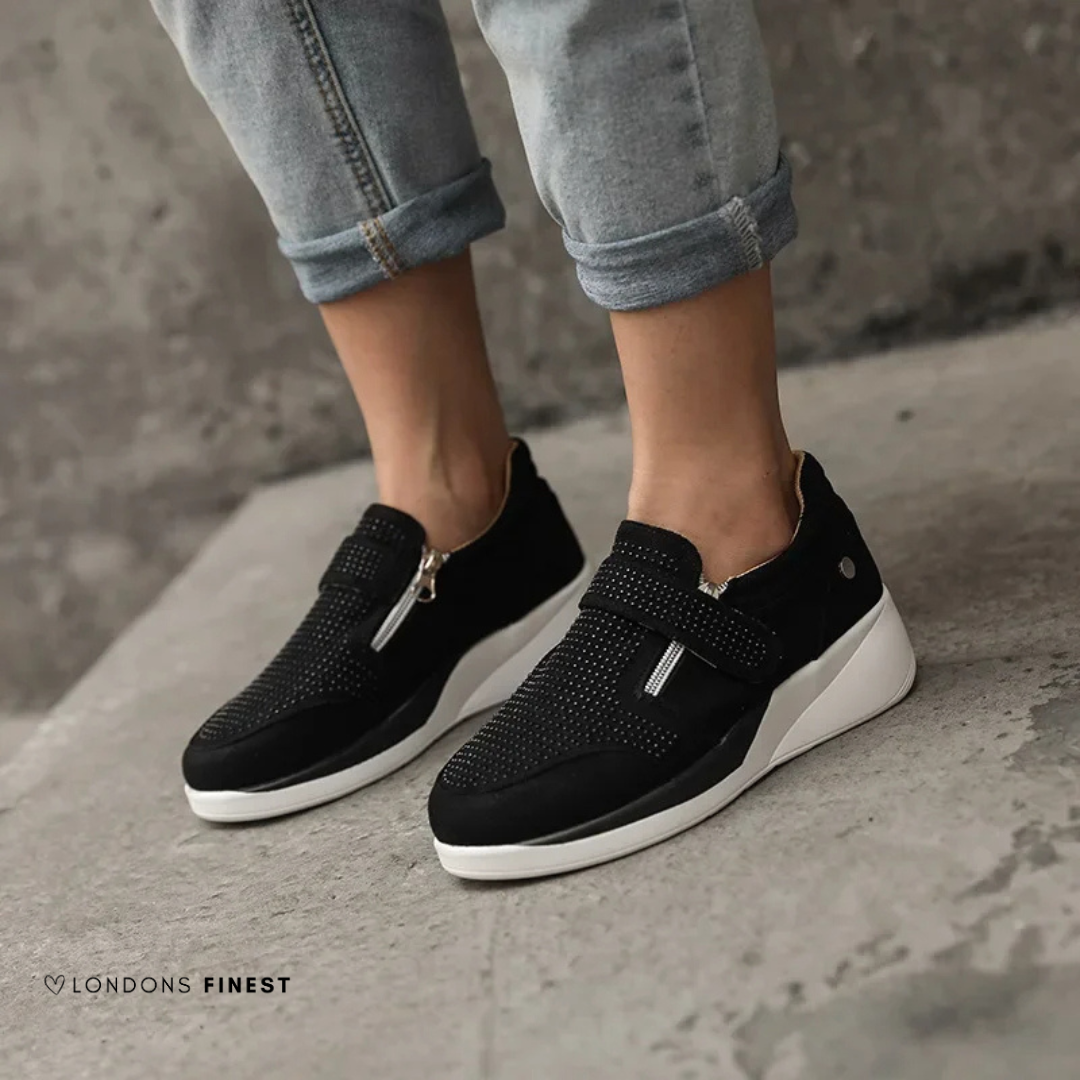 Comfortable women's walking sneakers with superior cushioned arch support, perfect for active everyday wear.