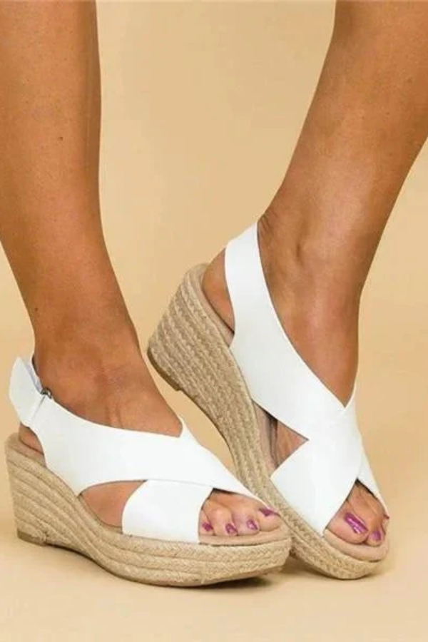 White women's supportive espadrille wedge sandals, perfect for all-day comfort & chic summer style.