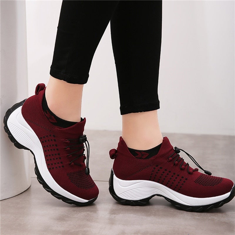 Women's supportive walking sneakers for all-day comfort. Cushioned soles & ergonomic design.