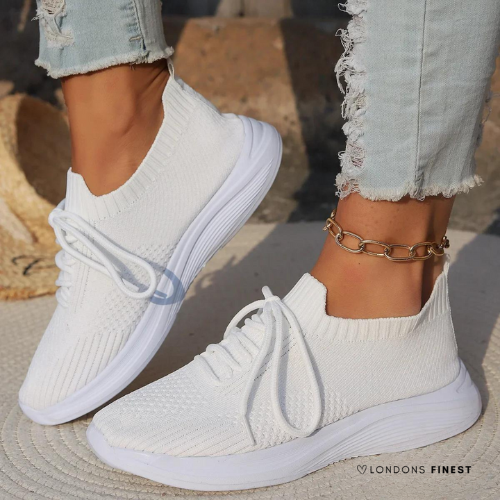 Women's supportive walking sneakers for all-day comfort, featuring breathable mesh and ergonomic design, ideal for active lifestyles.