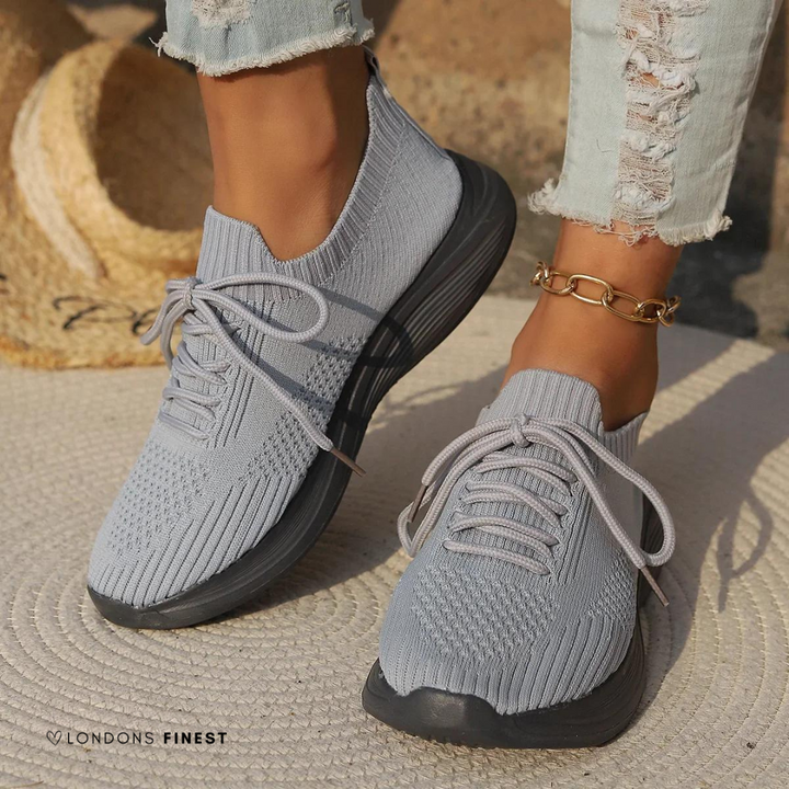 Stylish women's lightweight casual sneakers, perfect for everyday wear. Enjoy breathable comfort & support for an active lifestyle.