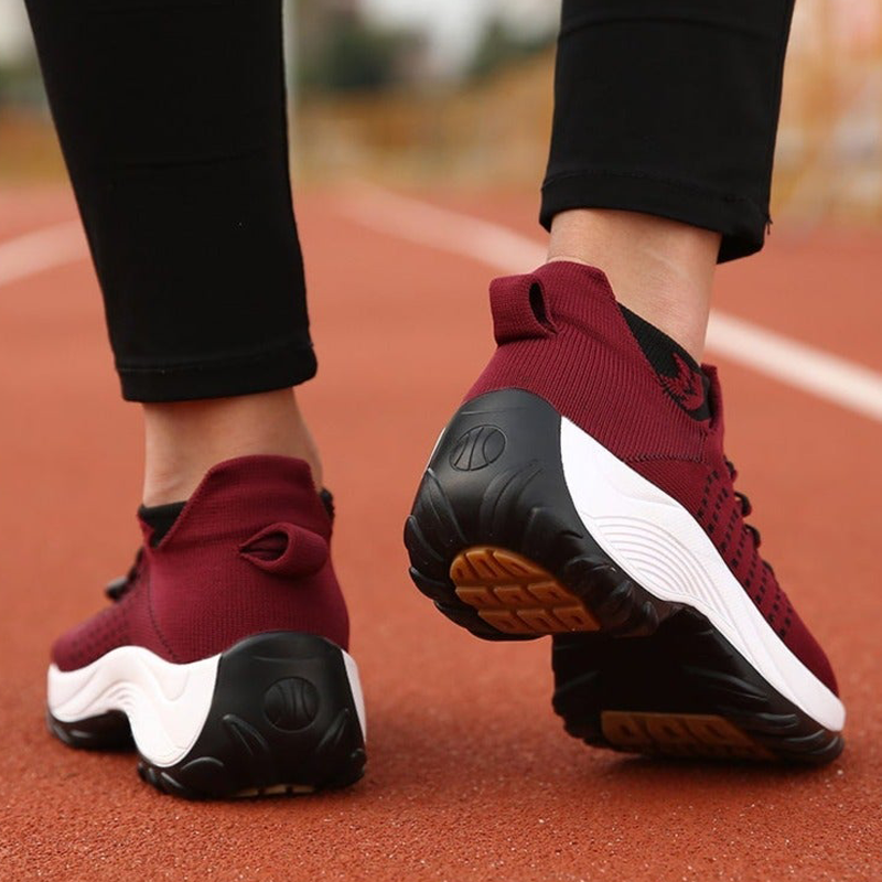 Supportive women's sneakers, great for walking. Cushioned design relieves foot pain.