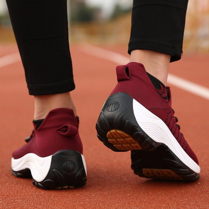Supportive women's sneakers, great for walking. Cushioned design relieves foot pain.