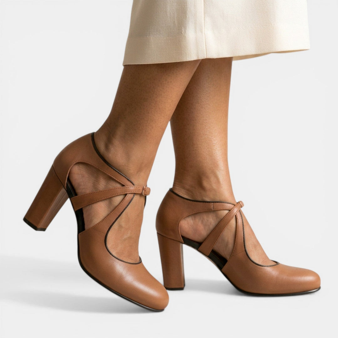 Women's T-Strap high heel sandals with buckle closure and round toe for elegant evening wear.
