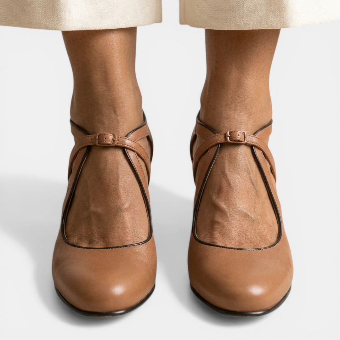Chic women's T-Strap high heels, featuring a round toe & secure buckle closure, perfect for dressy occasions.