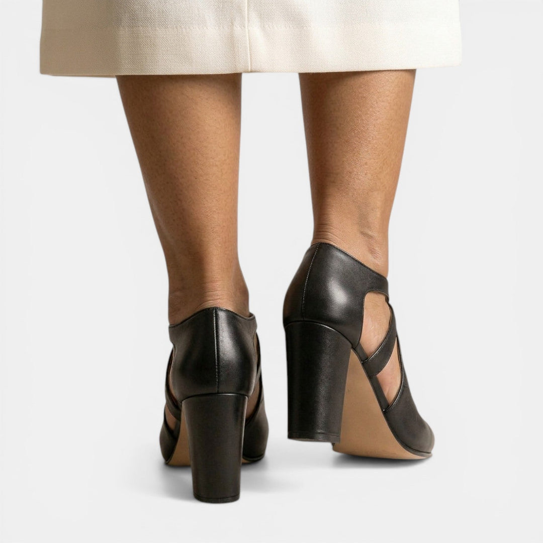 Women's T-Strap high heel sandals. Round toe, buckle closure. Elegant & comfortable dress footwear.