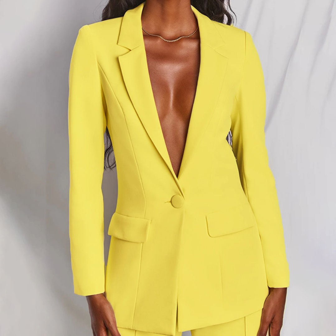 Elegant two-piece women's suit set. Perfect for formal office attire.