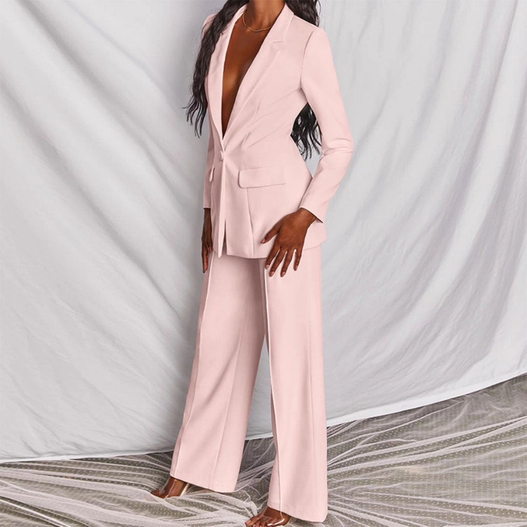 Chic women's two-piece set. Tailored blazer & trousers for office style.