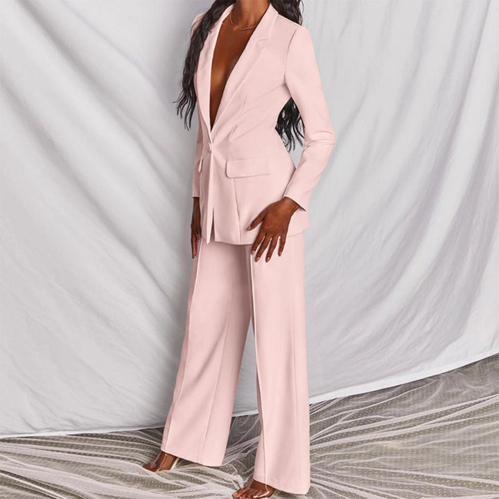 Chic women's two-piece set. Tailored blazer & trousers for office style.