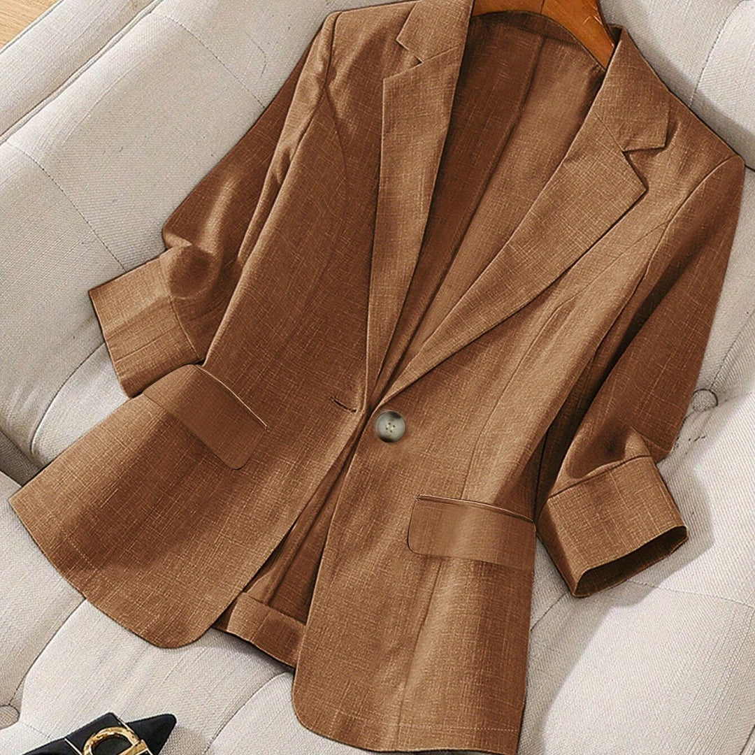 Fresh spring women's tailored cropped blazer, smart for business casual office outfits.
