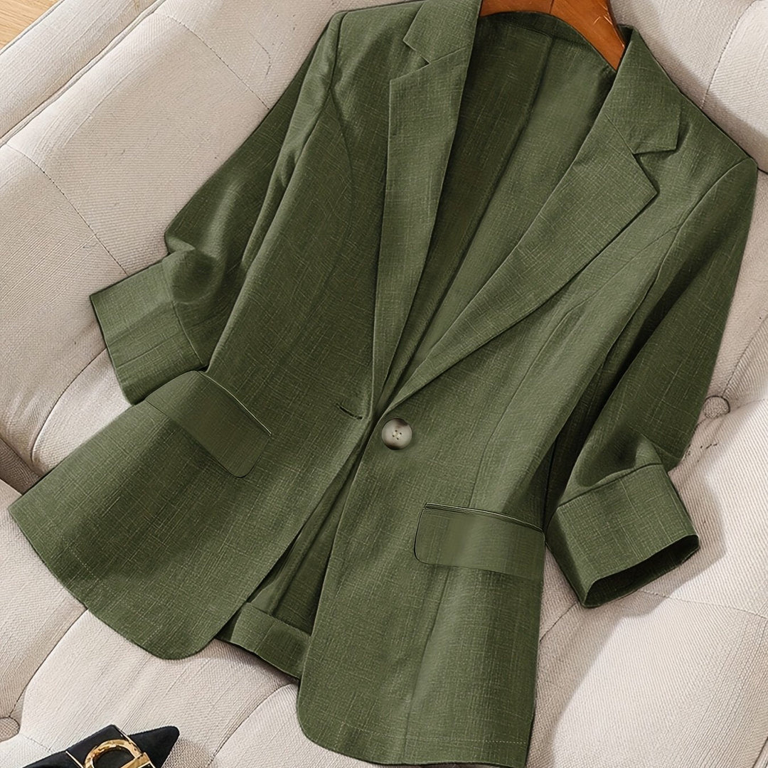 Women's tailored cropped jacket, professional business casual office wear.