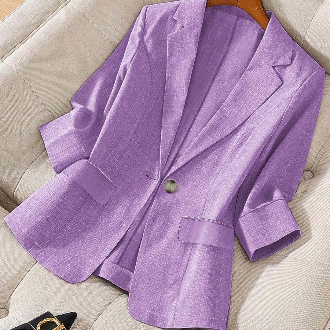Polished women's tailored cropped blazer, smart casual sophisticated style for work.
