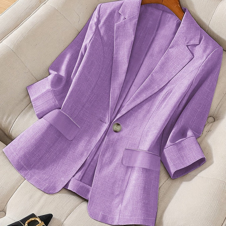 Polished women's tailored cropped blazer, smart casual sophisticated style for work.