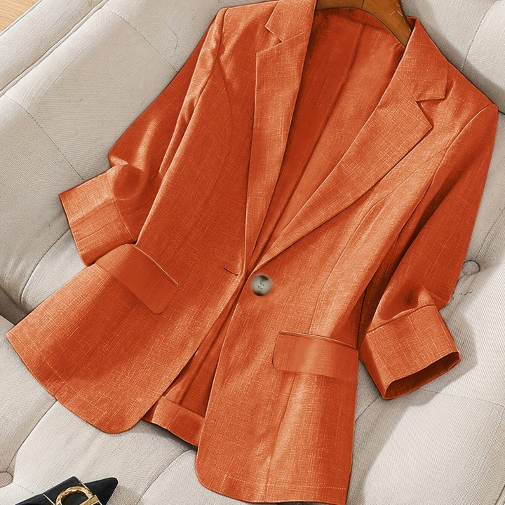 Women's tailored cropped blazer, professional fashion staple for business casual workwear.