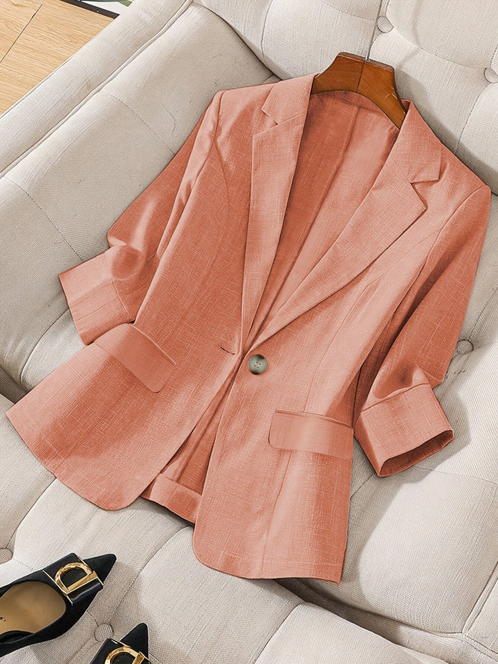 Chic spring tailored cropped blazer, perfect for women's business casual office wear.