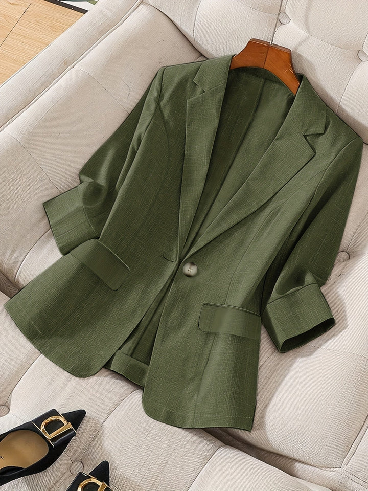 Smart casual women's tailored cropped blazer, ideal for work and sophisticated style.