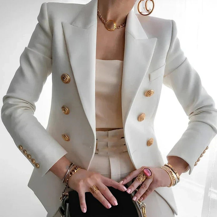 Chic double-breasted blazer for women, tailored with gold buttons. Ideal for professional office wear.