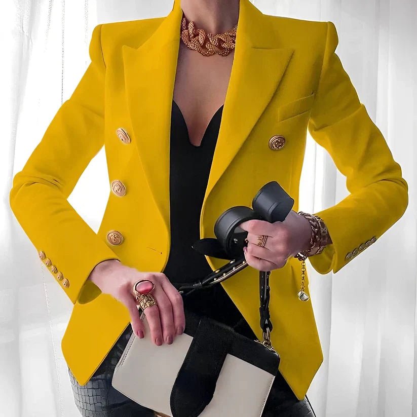 Structured women's gold-button double-breasted blazer. Tailored for a polished professional look.