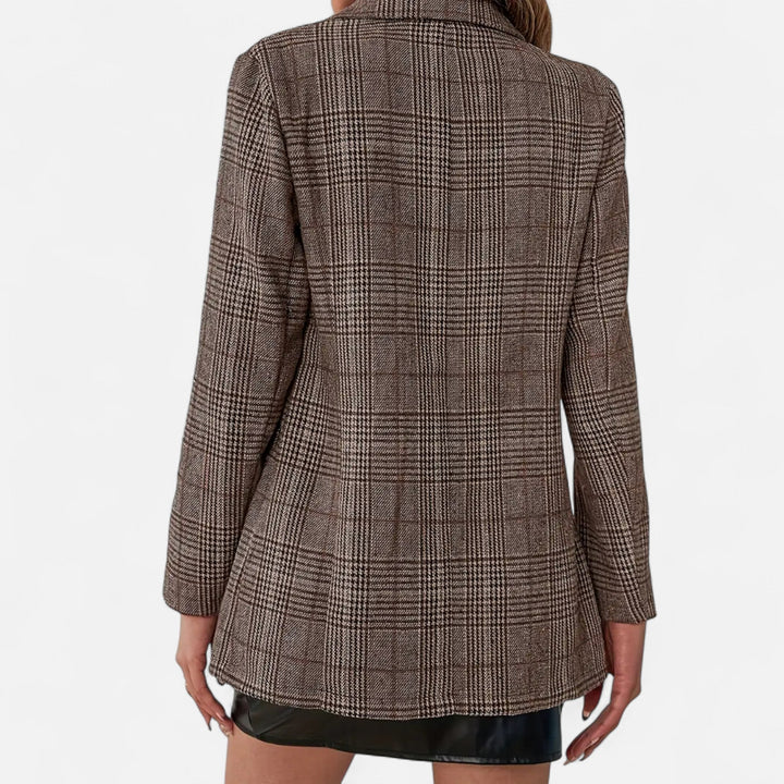 Stylish women's plaid blazer, comfortable yet tailored for modern office looks and sophisticated evening events.