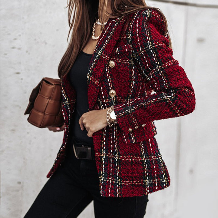 Statement women's tailored plaid blazer, double-breasted with gleaming gold buttons for a chic look.