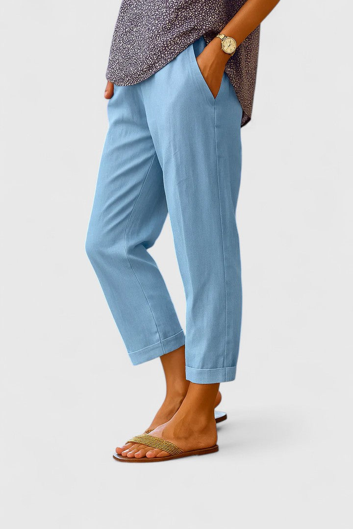 Women's tailored straight leg ankle pants, versatile for smart casual or elegant wear, with functional pockets.