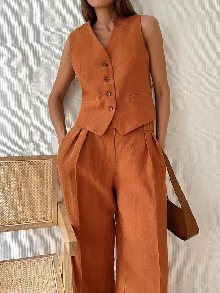 Stylish women's matching two-piece set: tailored waistcoat & wide leg trousers. Chic for summer office wear.