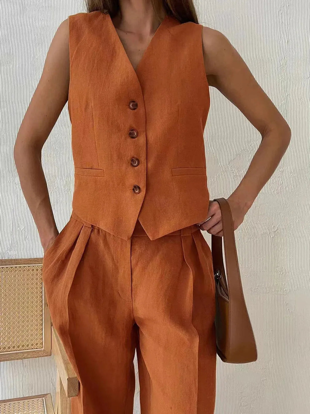 Tailored women's waistcoat and wide leg trousers. This elegant pant set is perfect for office wear or summer events.