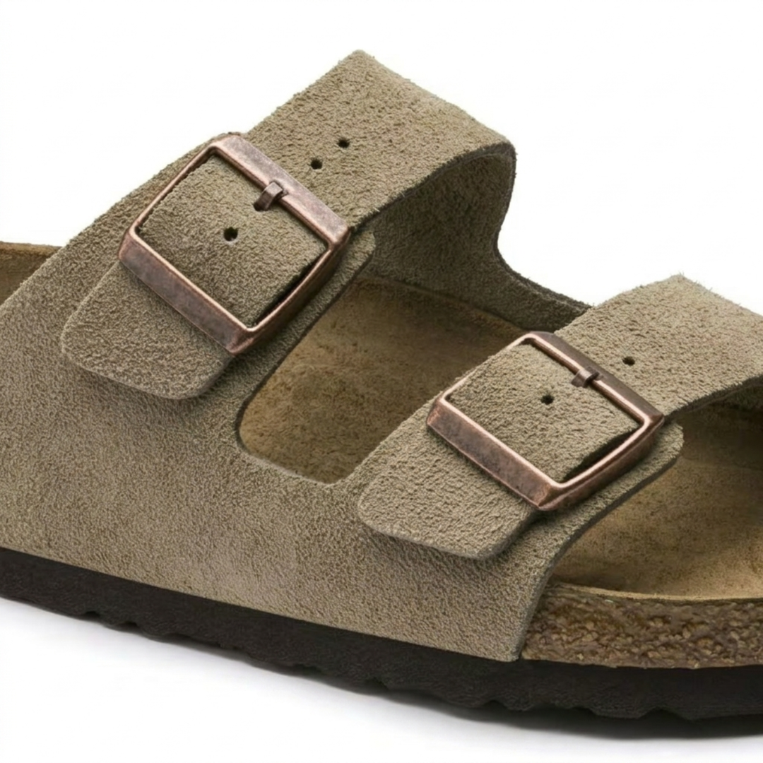 Women's taupe open-toe sandals, flat casual design with an adjustable strap & anatomical footbed for support.