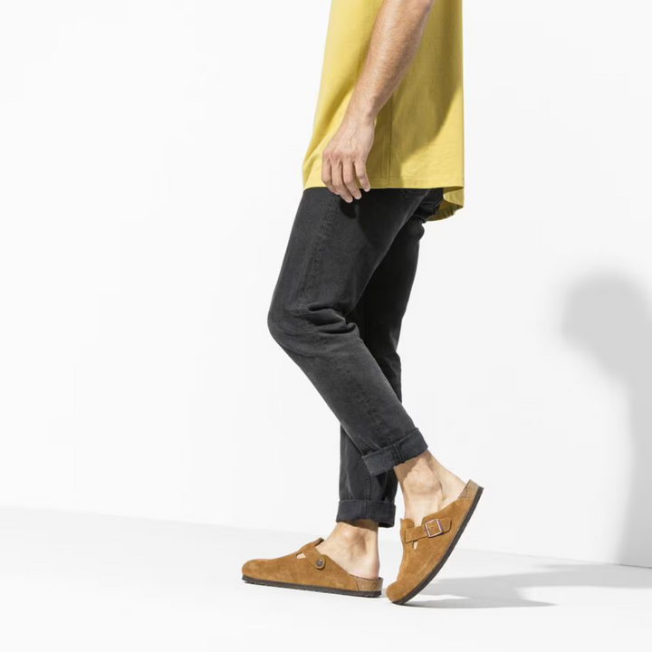 Supportive taupe women's clogs featuring a cushioned anatomical footbed for lasting comfort.