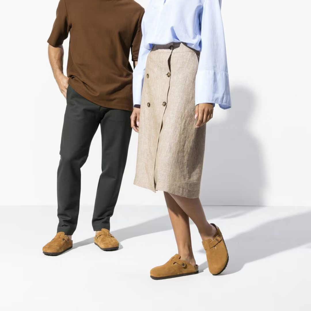 Fashionable taupe women's clogs combining style with a cushioned anatomical footbed for comfort.