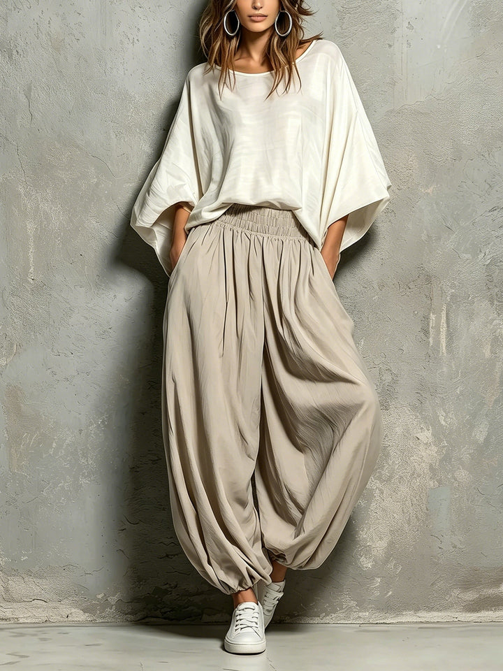 Women's taupe high waist wide leg harem pants with drawstring. Comfortable and stylish for casual wear & boho fashion.