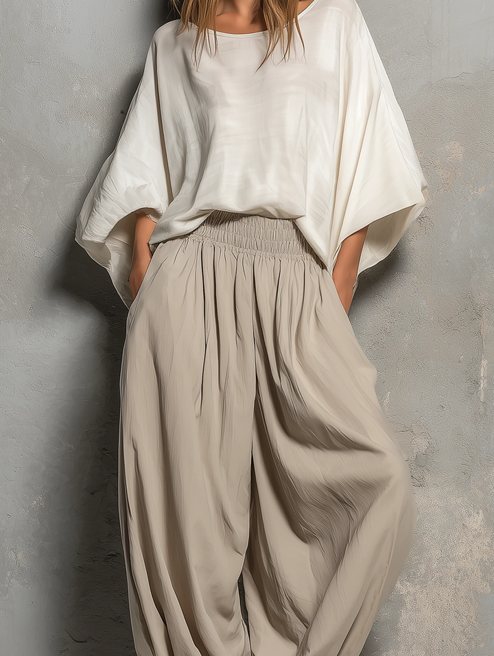 Stylish women's taupe drawstring harem pants. High waist, wide leg design, great for spring/summer casual fashion.