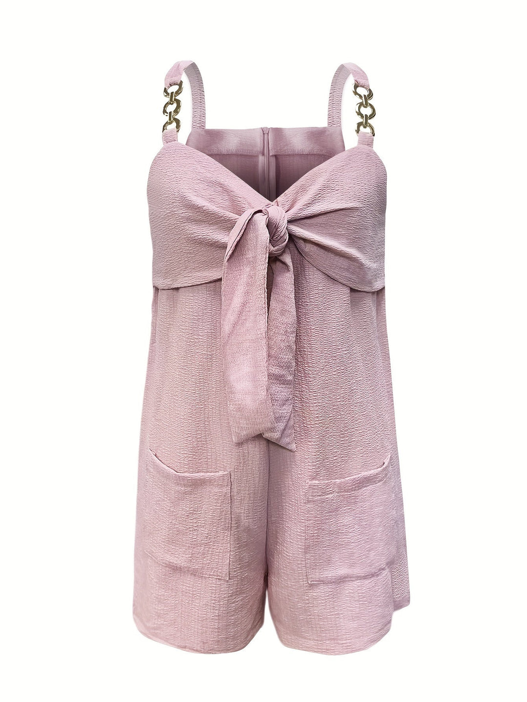 Model wearing a women's textured short romper with sweetheart neck and fashionable chain straps.