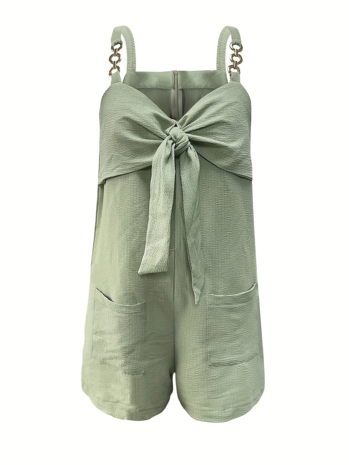 Women's vacation wear romper, textured design, sweetheart neckline, and delicate chain details.