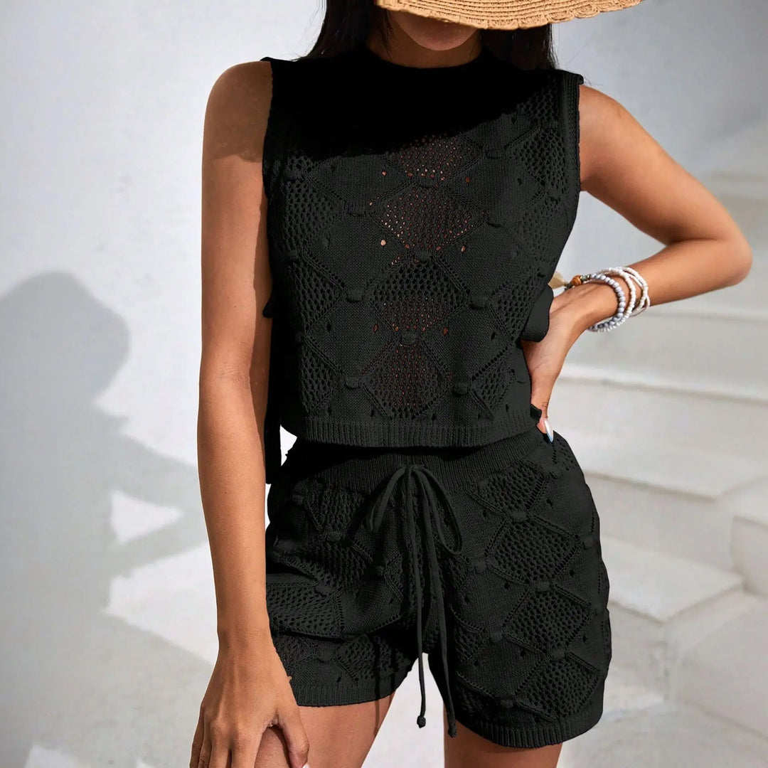 Ladies' textured two-piece summer outfit: a comfortable crop top & trendy shorts for beach vacations.